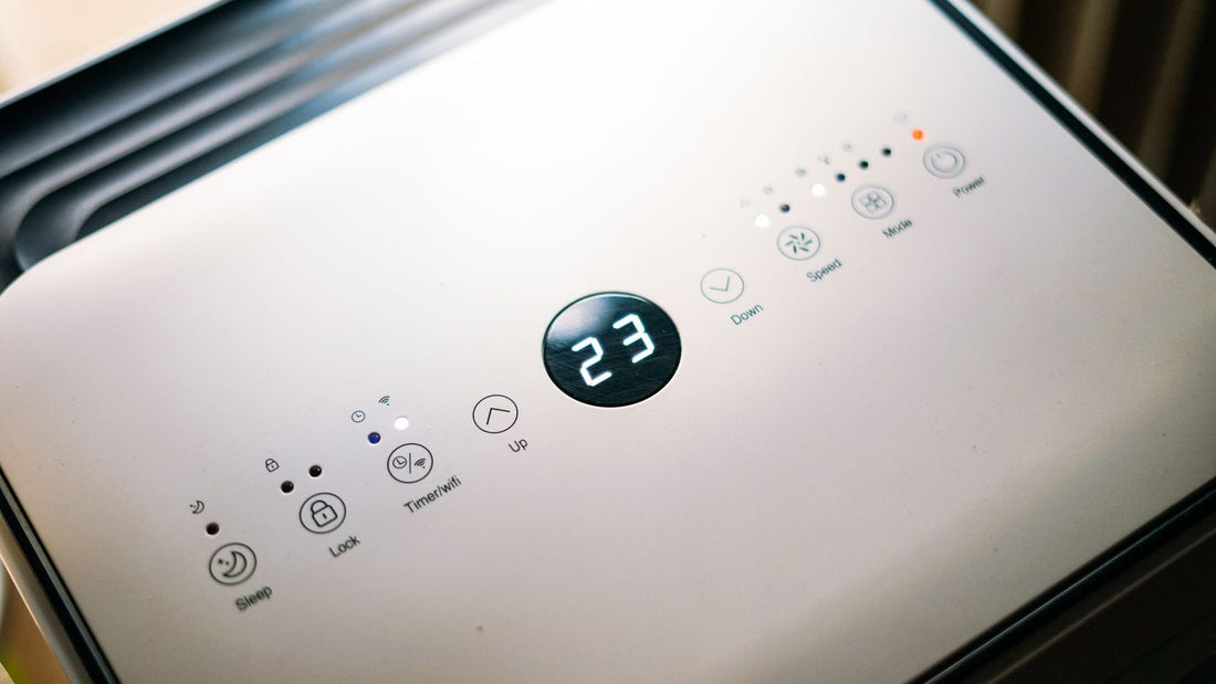Air conditioner control panel with digital display showing 23 and multiple function buttons, a reset air conditioner unit interface